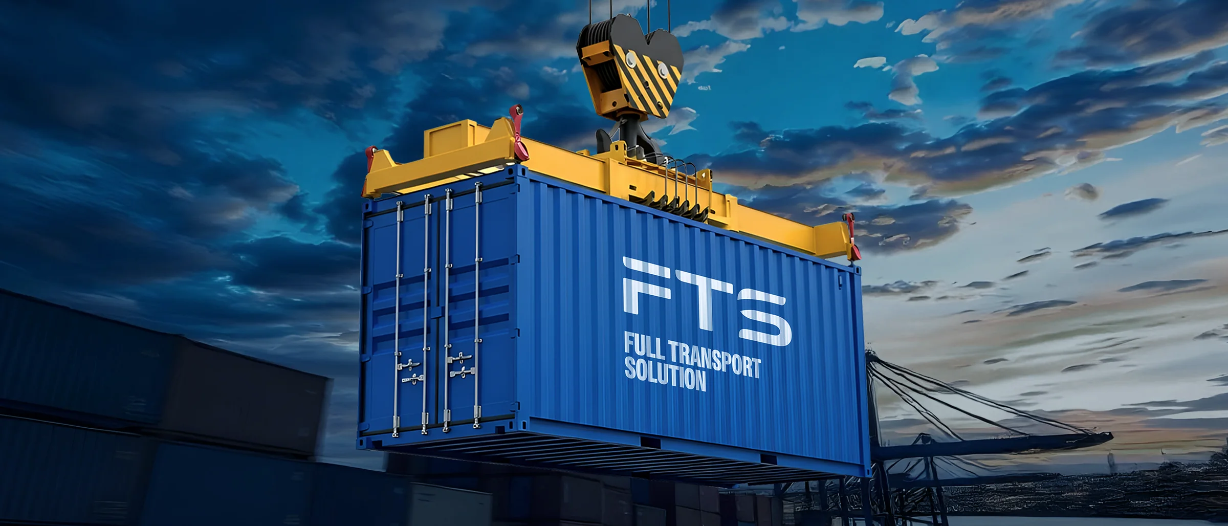 FTS: contenedor azul con el logotipo, izado por una grúa al atardecer